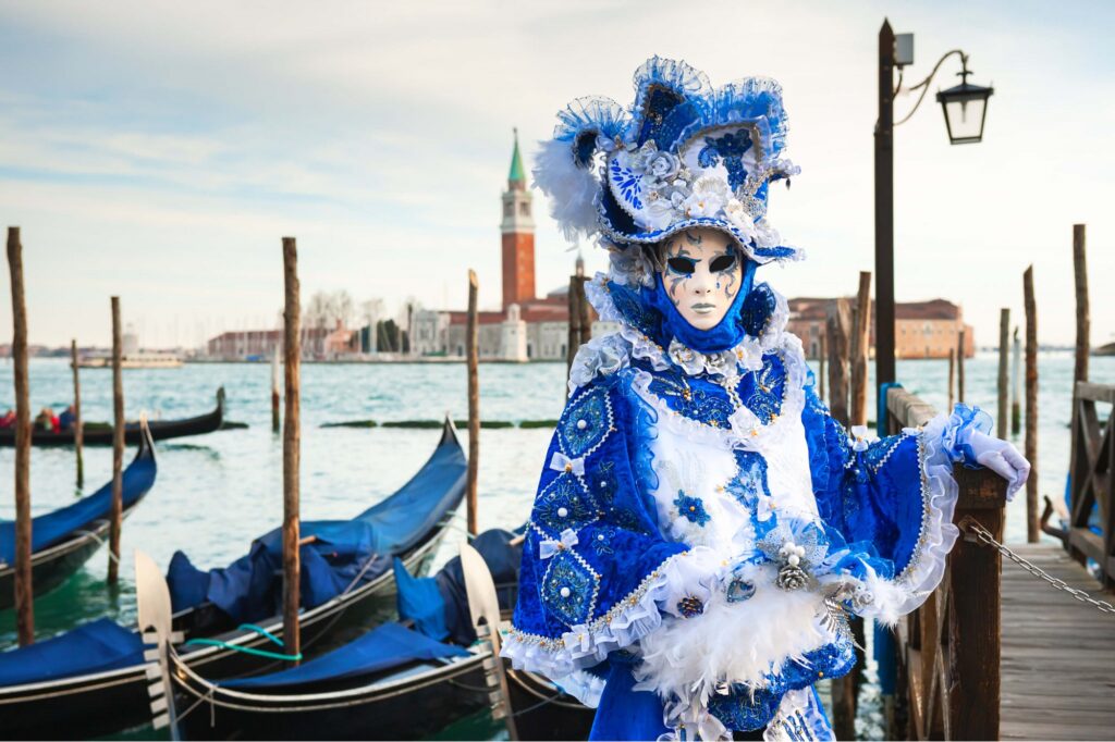 A costumed actor during a Venice carnival tour.