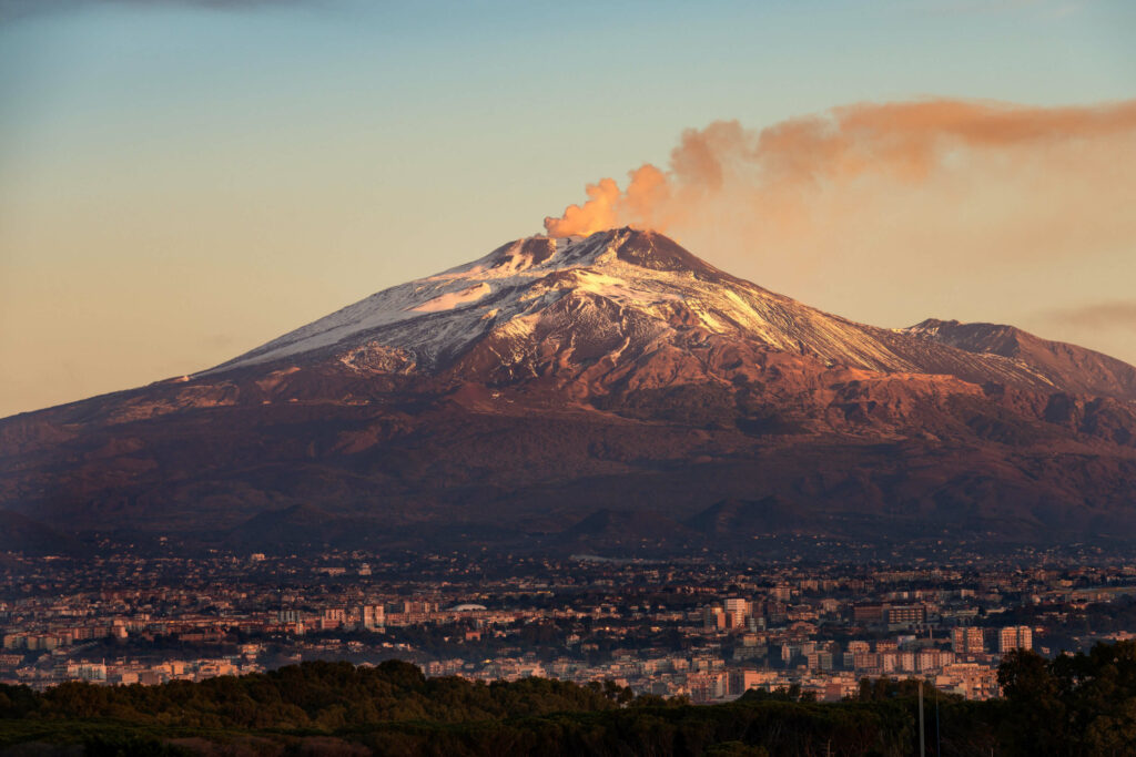 A photo showing the stunning Mount Etna in the distance.