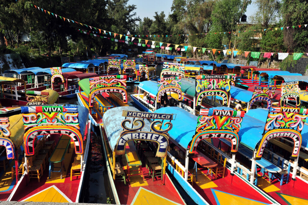 Photo of colourful gondolas in Mexico City.