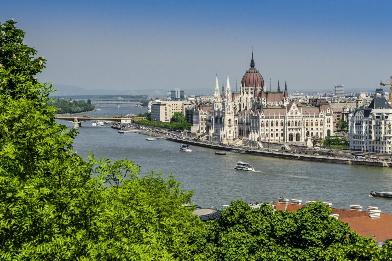 The image is looking down the river toward the Hungarian Parliament building