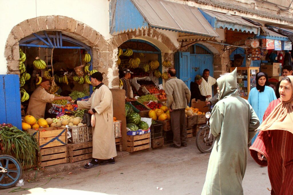 local people in morocco at a food market